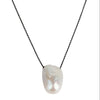 Elegant baroque pearl pendant necklace with black chain, featuring a lustrous white freshwater pearl center.