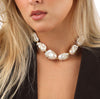 Elegant baroque pearls necklace featuring oversized, lustrous pearls in a sophisticated choker design.