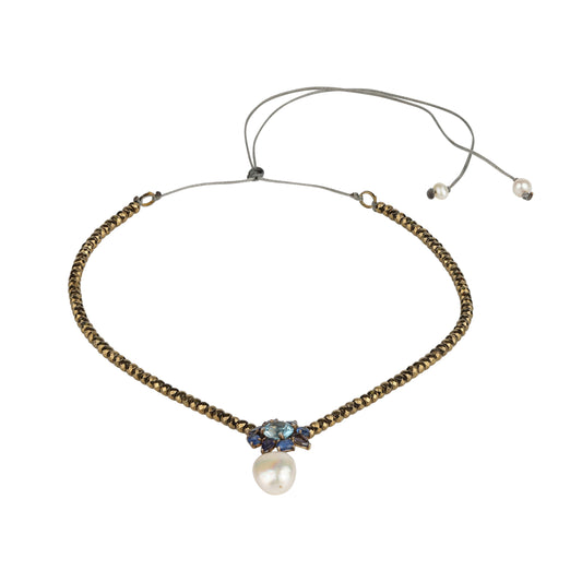 Necklace with Freshwater baroque pearl, gold hematites, white topaz and sapphire on black oxidized silver