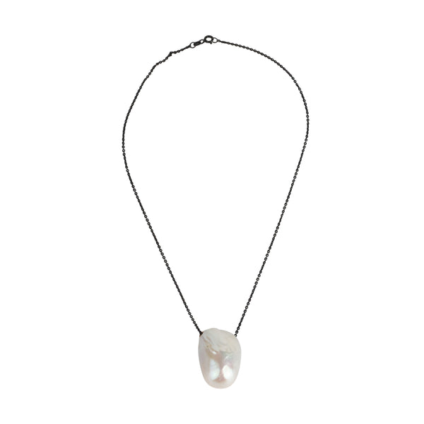 Amanda JLL Pearl necklace with a large baroque freshwater pearl on a black chain.