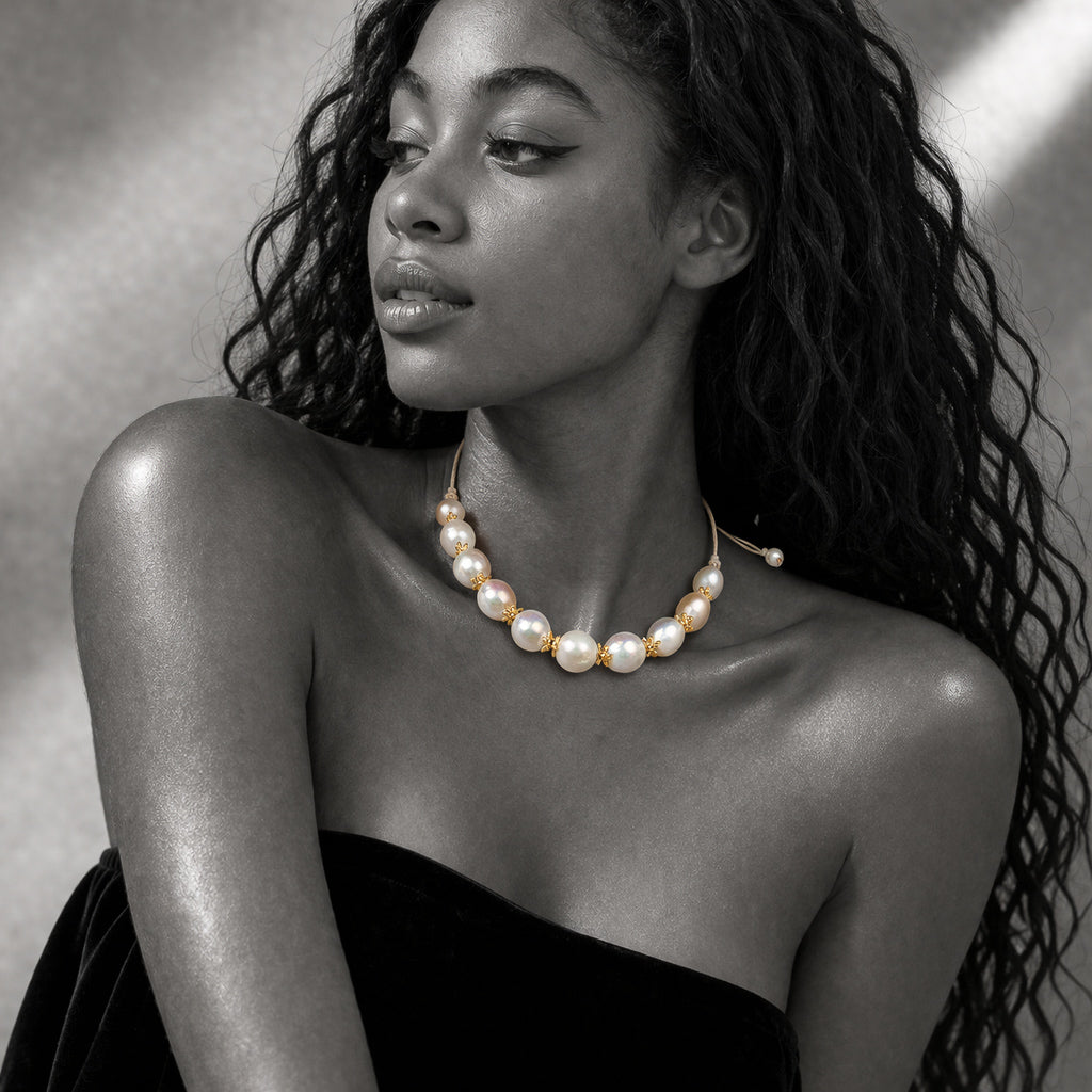 JLL Pearl Ella necklace worn – round pearls and gold flower findings as a choker