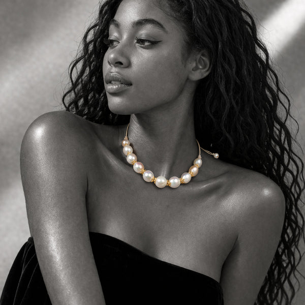JLL Pearl Ella necklace worn – round pearls and gold flower findings as a choker