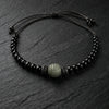 Hydra JLL Pearl necklace on slate – black onyx, spinel and peridot on satin thread