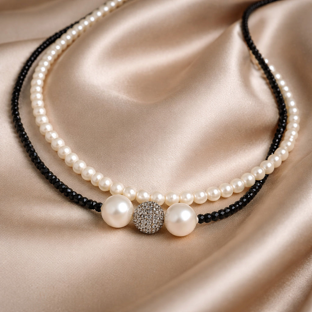 Mina JLL Pearl necklace on fabric – long pearl and spinel necklace with white topaz accent