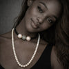 JLL Pearl Mina necklace worn long – freshwater pearls, black spinels and white topaz ball