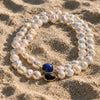 Nati JLL Pearl necklace on sand – freshwater pearls, lapis lazuli and sapphire
