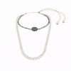 Beautiful Pearls necklace Lola with a green emerald and diamonds pendant on a white background-JLLPearl