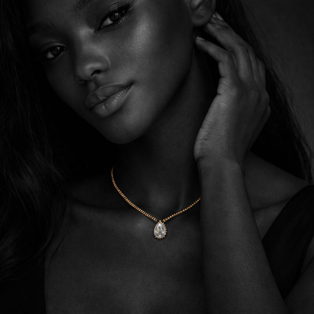 JLL Pearl Romy necklace worn – gold hematites, white topaz and yellow sapphire.