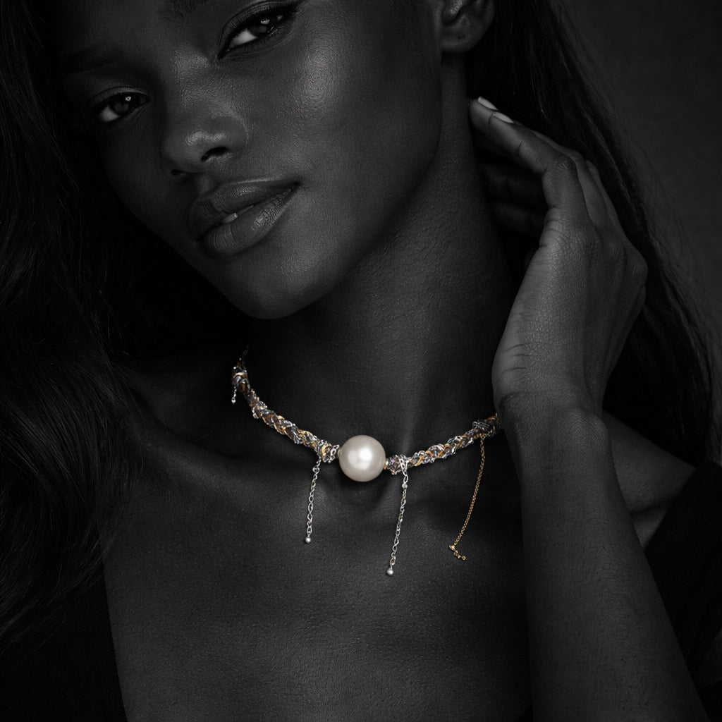 JLL Pearl Samos necklace worn – round pearl on braided silver and gold chain