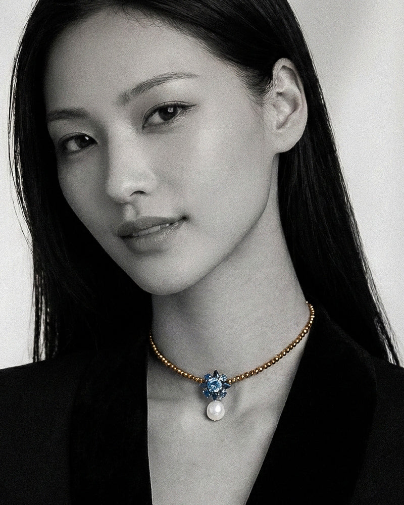 Necklace Flowerdream in Hematites with pearl, Topaz and Sapphire, worn by model-JLLPearl