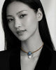 Necklace Flowerdream in Hematites with pearl, Topaz and Sapphire, worn by model-JLLPearl