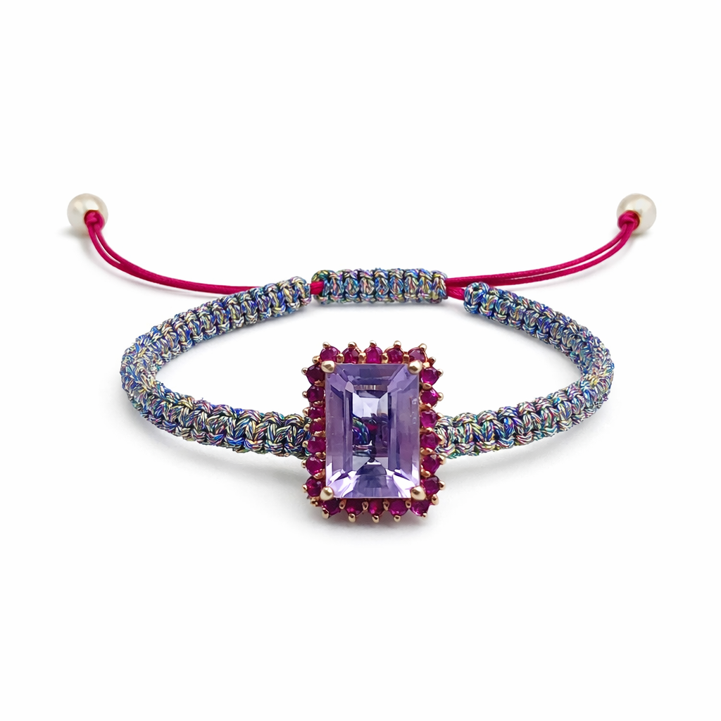 Bracelet with a purple gemstone on a white background