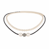 Pearl necklace with black cord and decorative beads on a white background