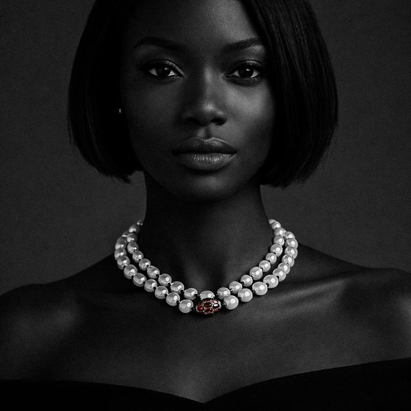 Long baroque freshwater pearl necklace with black satin bows and garnet diamond accent by JLL Pearl
