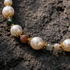 Macro detail of Miami necklace, freshwater pearls with multicolor gemstones and gold spacers — JLL Pearl